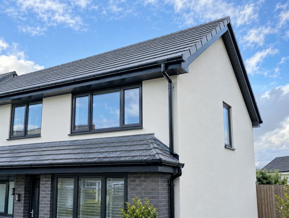 New black fascias, soffits and guttering on a house